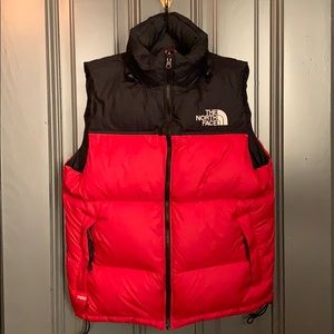 Double colored puffy north face vest